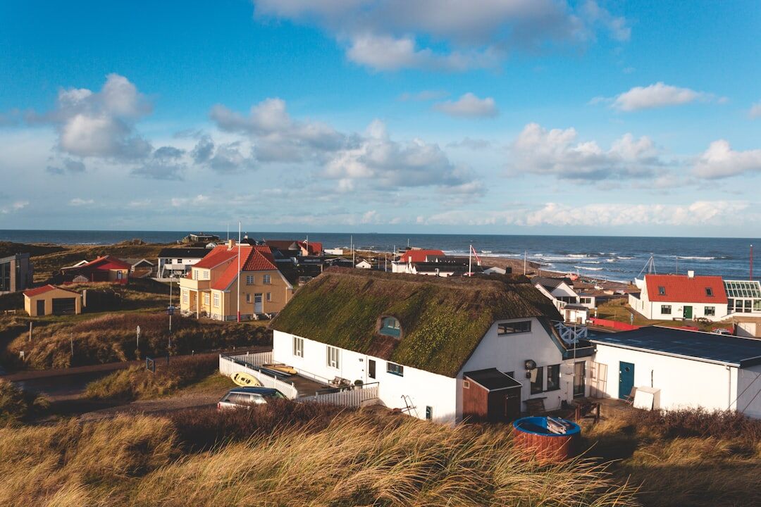 Documentary photographer taking pictures outdoors in a Danish village
