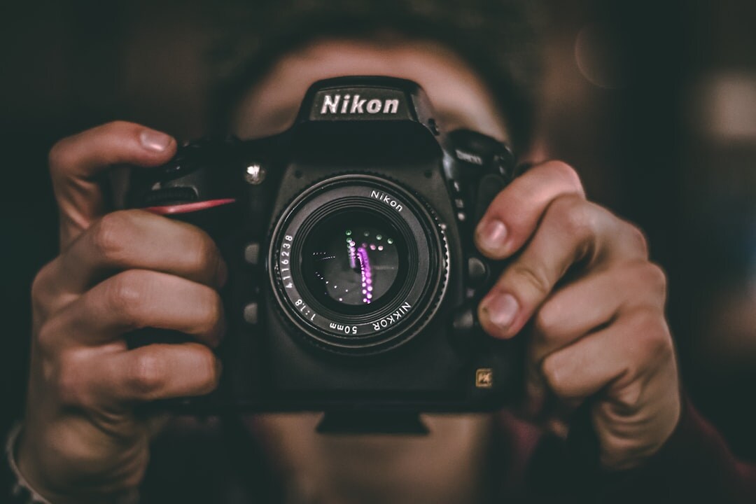 photographer with camera
