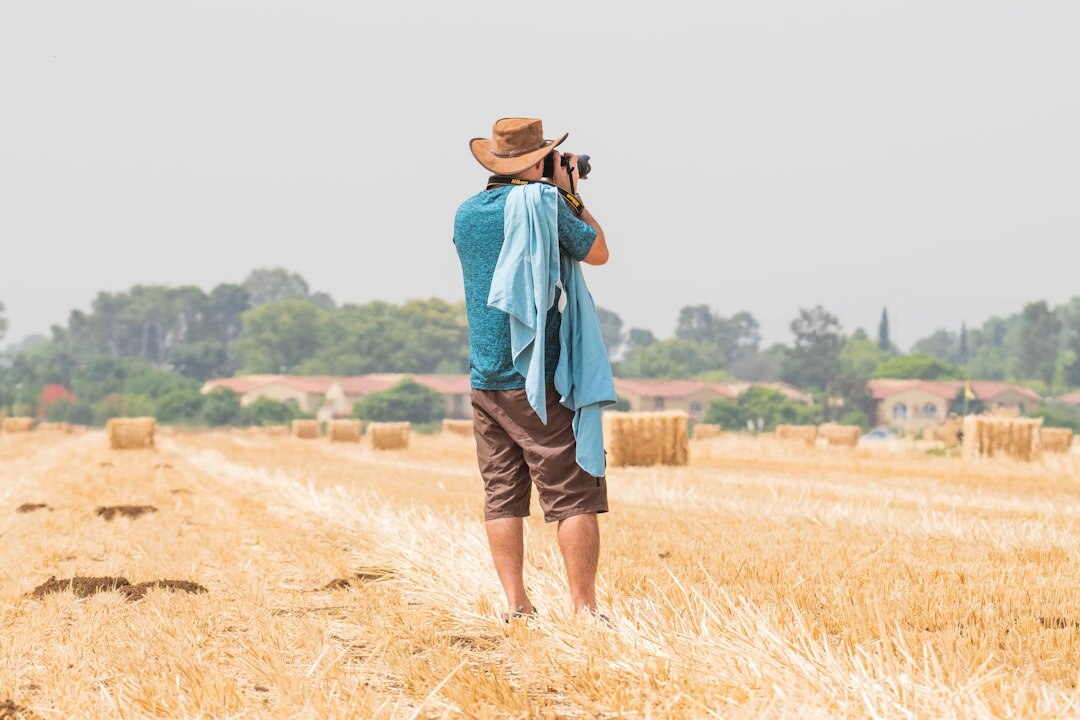 documentary photographer in field